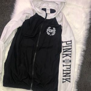 pink black and white windbreaker